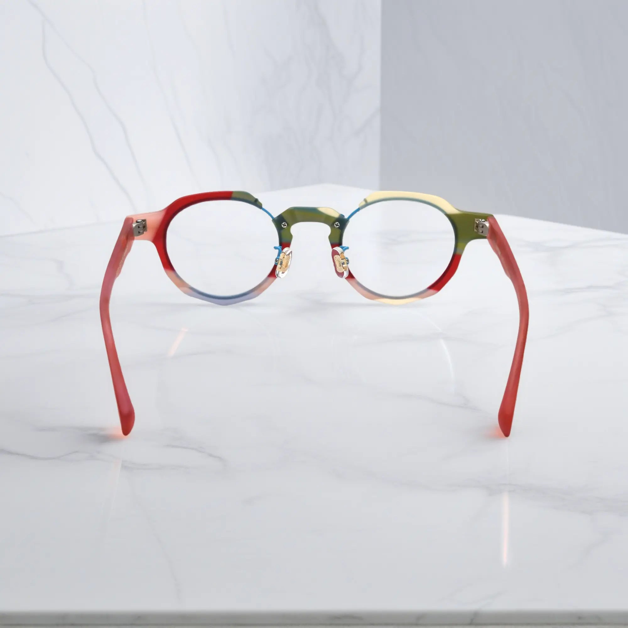 Rear angle of VoyueLens™ Rose Blush eyeglasses showcasing frame curvature and temple tips