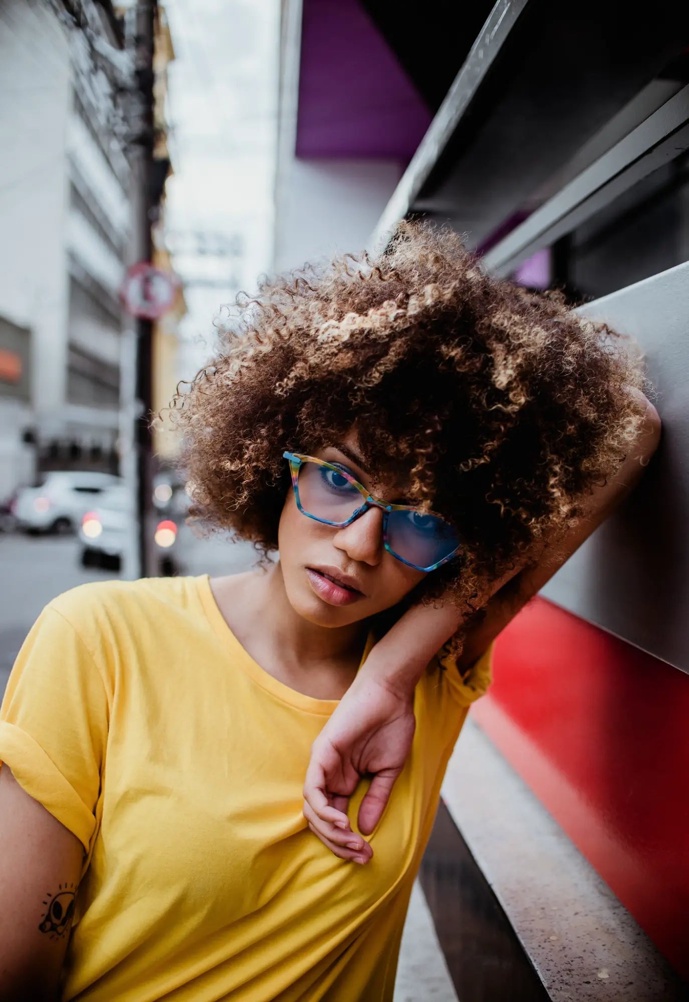 Model wearing VoyueLens™ ColorPop Cat-Eye Eyeglasses in Ocean Spectrum, showcasing the statement-making, vintage-inspired style perfect for fashion or prescription use.