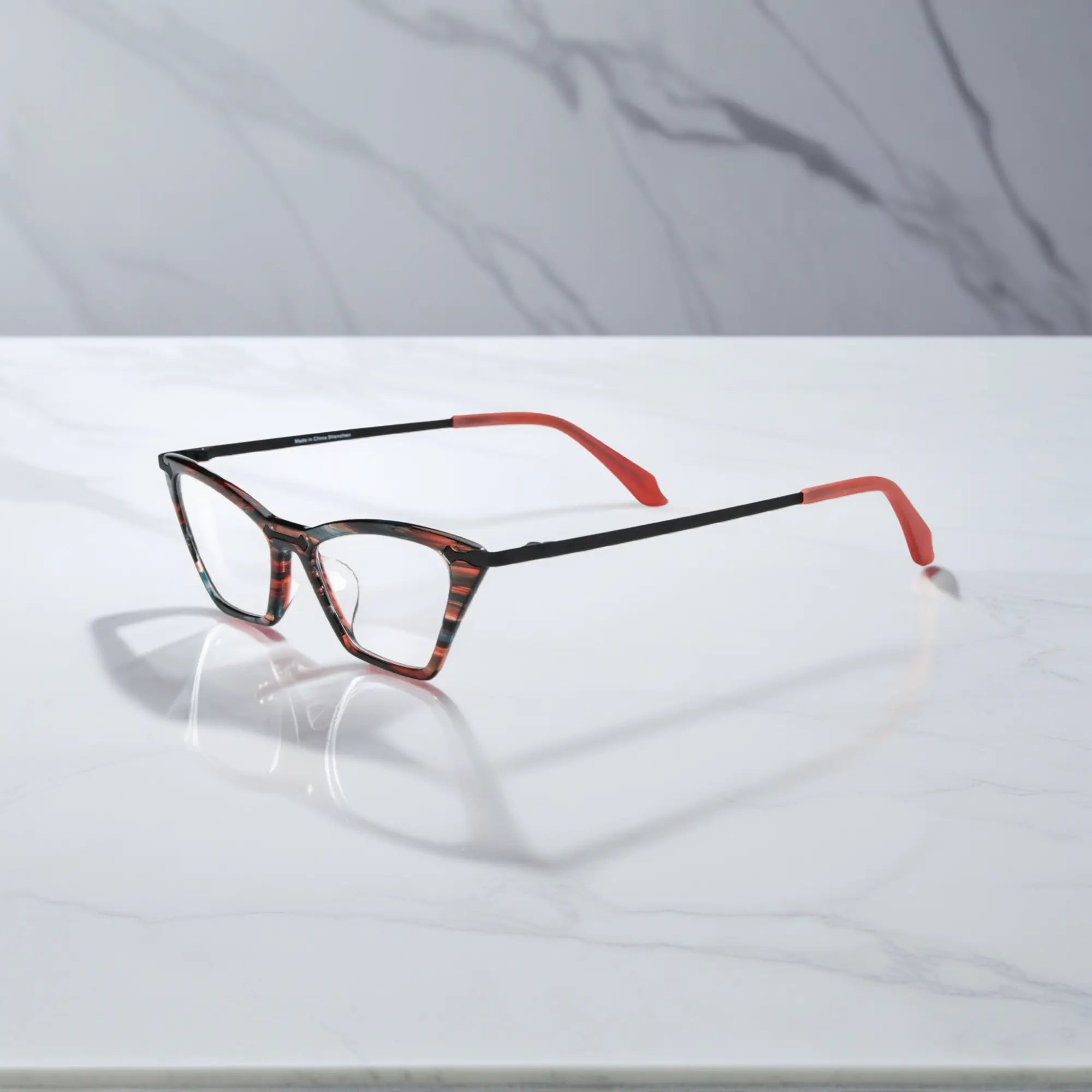 Side view of VoyueLens™ ColorPop Cat-Eye Eyeglasses in Ember Tortoiseshell, highlighting the slim metal temples and ergonomic design suitable for everyday wear.